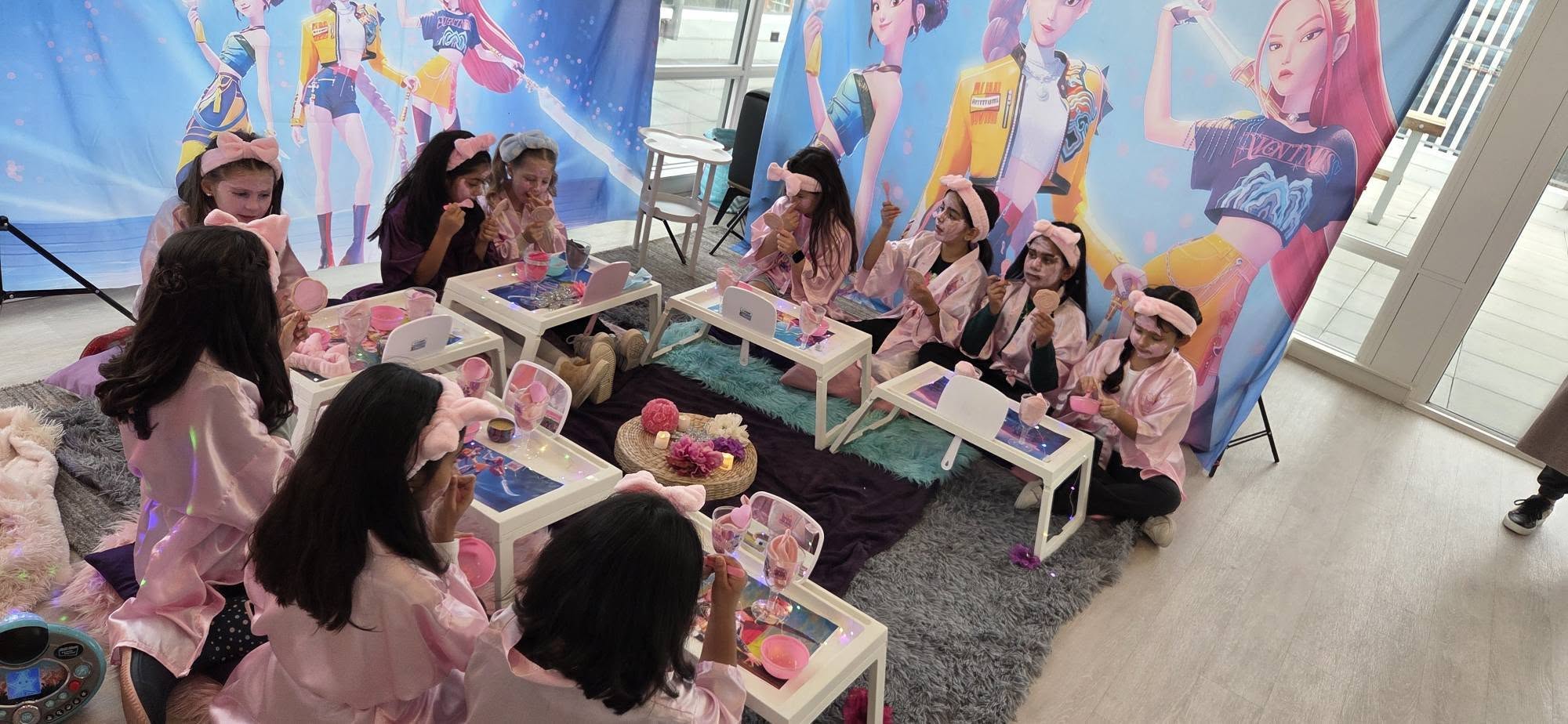 Group of girls at the Divas Glam Spa Party trays with face masks during the K-Pop themed celebration