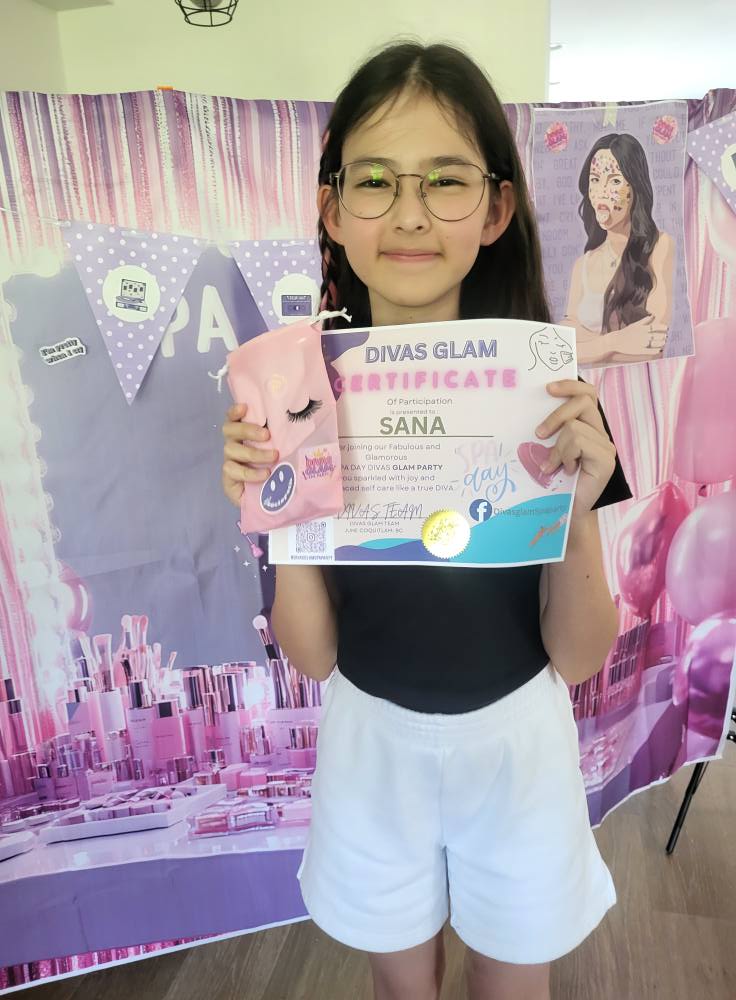 Birthday girl with her Divas Glam participation certificate