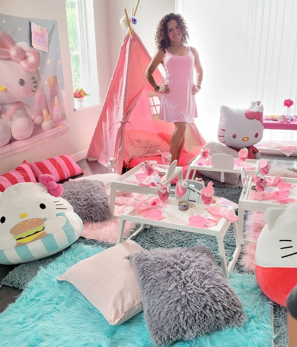 Divas Glam Spa Party Hello Kitty themed setup with pink teepee, Hello Kitty plushies and light-up spa tables, hosted by Party Learners Jenn