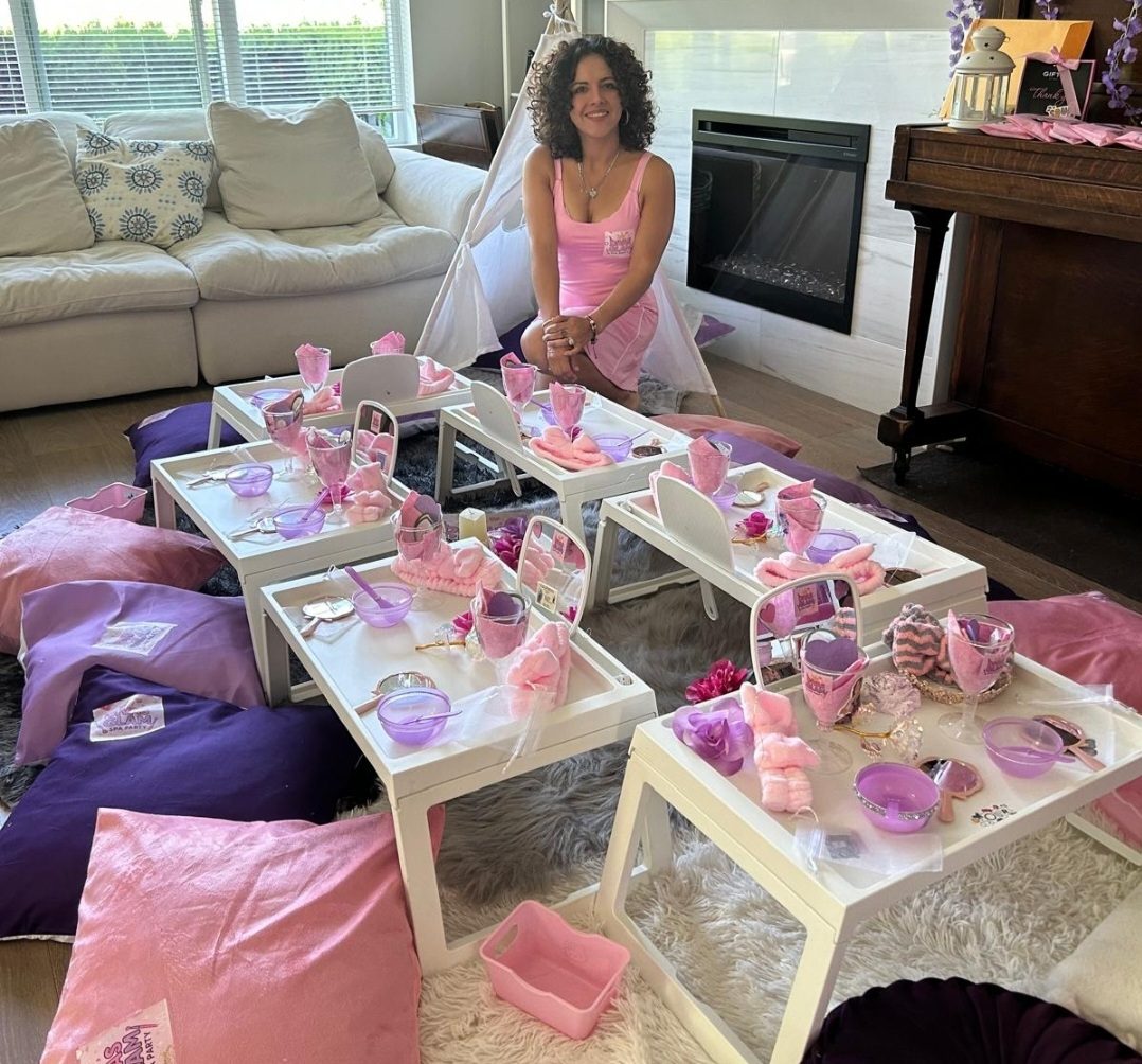 Divas Glam Spa Party home setup with purple and pink light-up tables, teepee in the living room and Party Learners host Jenn